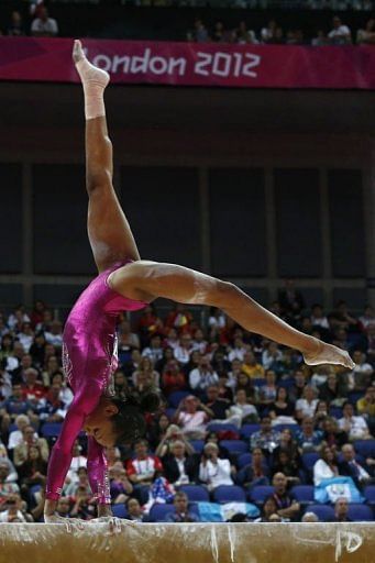 US gymnast Gabrielle Douglas performs on the beam